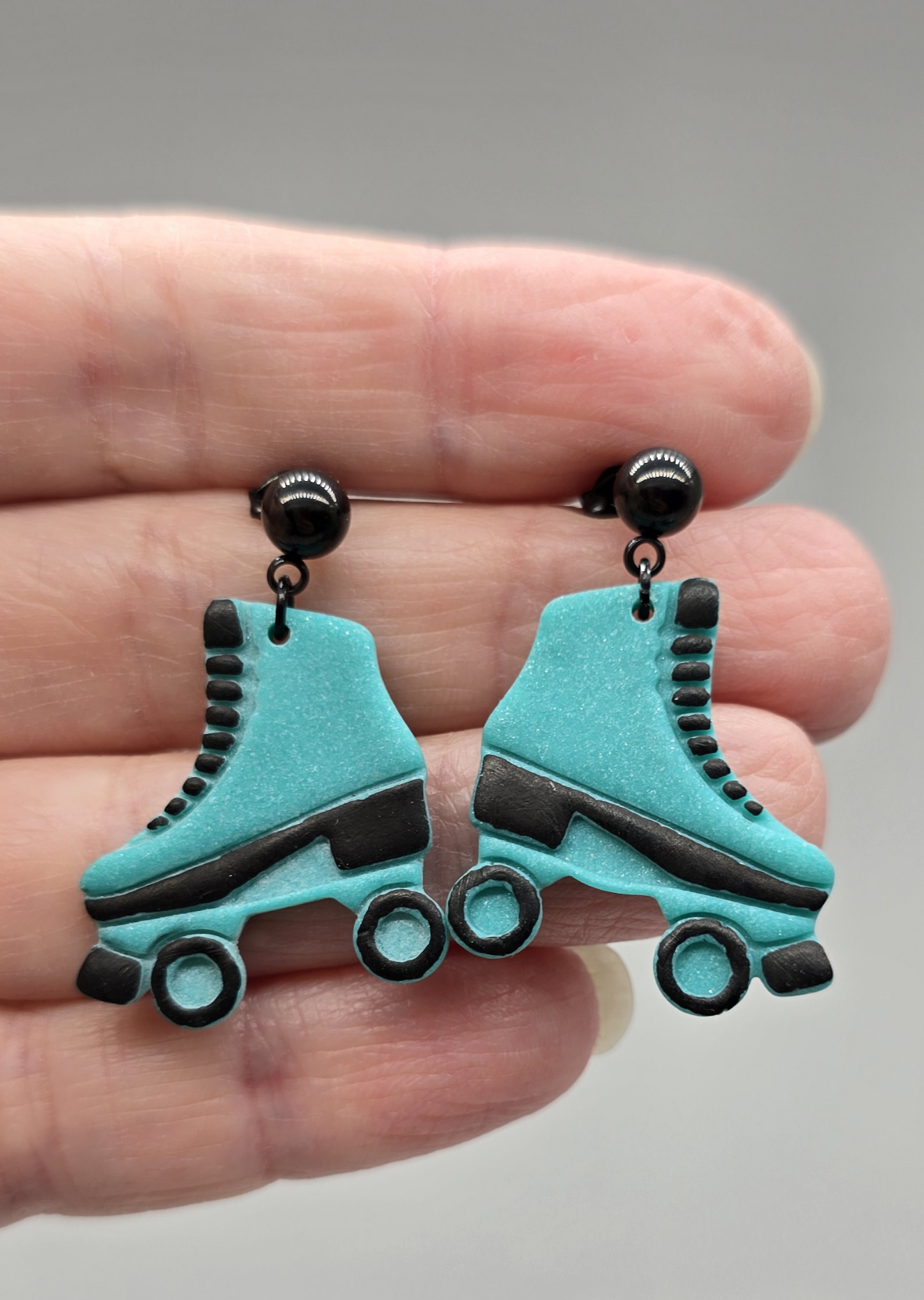 Teal and Black Retro Skate Earrings