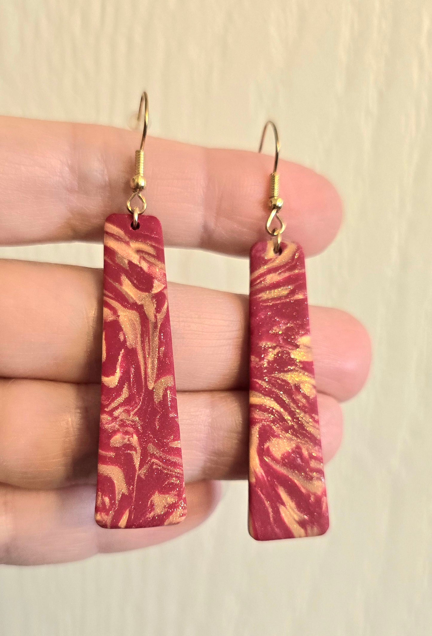 Gold and Red Swirl Dangle Earrings